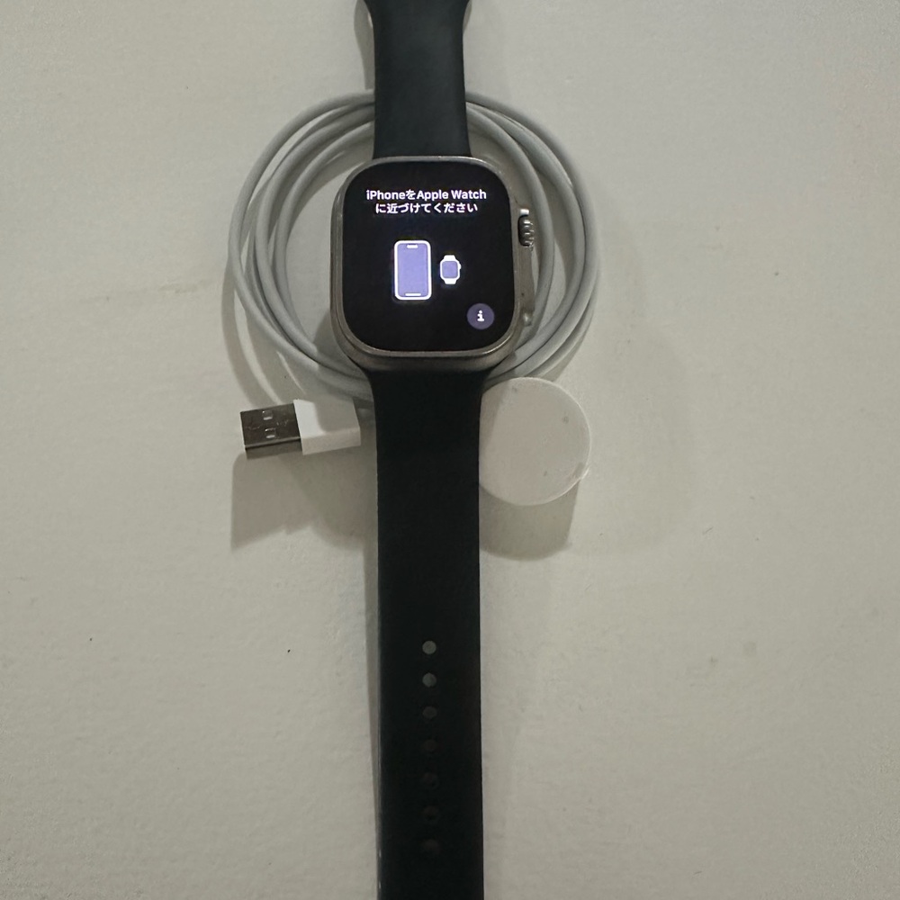 Apple Ultra Watch 49mm Titanium with Black Apple Band Charging cable Included